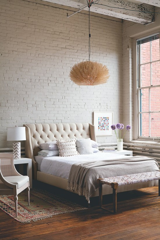 brick walls neutral bedroom