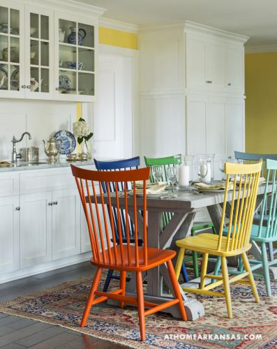 kitchen with different chair colors