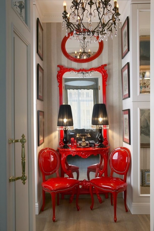 painted red chairs and mirror