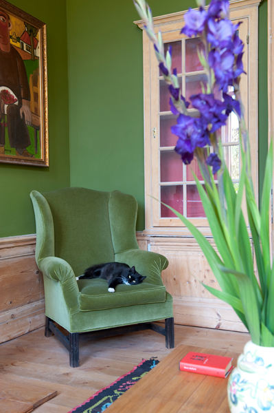 green walls and armchair