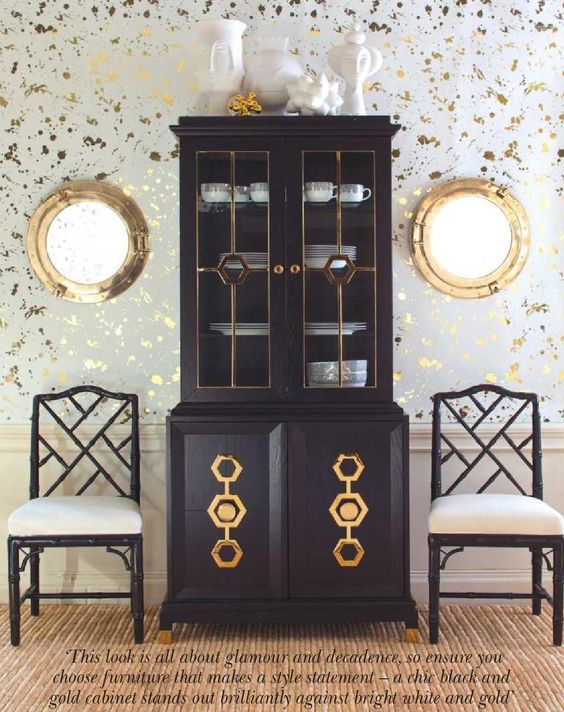 Ideal for storage and display, this piece is both practical and stylish. Turner vitrine with cabinet, f2,990; Chippendale chairs, £695 each; Drip wallpaper in gold and white, f300 per roll; accessories, from a selection; all Jonathan Adler. 
