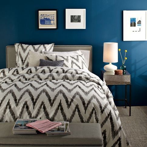 Modern/contemporary bedroom with accent wall painted in Benjamin Moore Marine Blue.