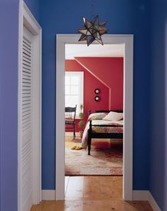 Hallway painted in Benjamin Moore Southern Belle. Looks great with a white trim.