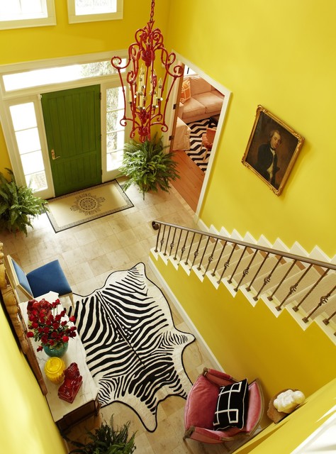 Benjamin Moore Goldfield entry way - bright yellow walls. via Jill Sorensen