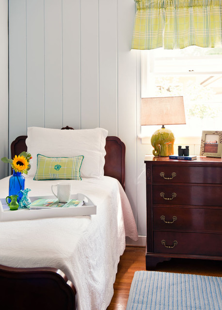 Traditional antique bedroom with walls painted in Benjamin Moore's Sweet Bluette.