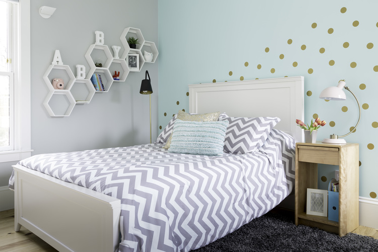 Sherwin Williams Tame Teal feature wall and white and gray chevron duvet