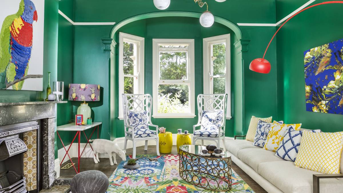 Tropical themes eclectic living room with walls painted in Dulux Green Paw Paw.
