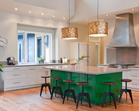 Contemporary l-shaped eat-in kitchen in Vancouver with an undermount sink, recessed-panel cabinets, green cabinets, quartz benchtops, grey splashback, glass tile splashback and panelled appliances. Paint color similar to Dulux Green Paw Paw - Via Stuart Wood Joinery