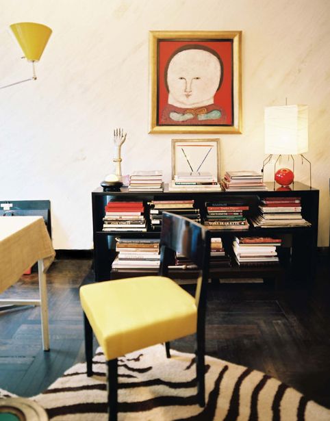 Albert Hadley's bookcase, zebra rug and yellow chair.