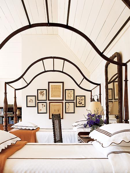 Amelia Handegan Traditional guest bedroom in black and white with ornate wrought iron bed