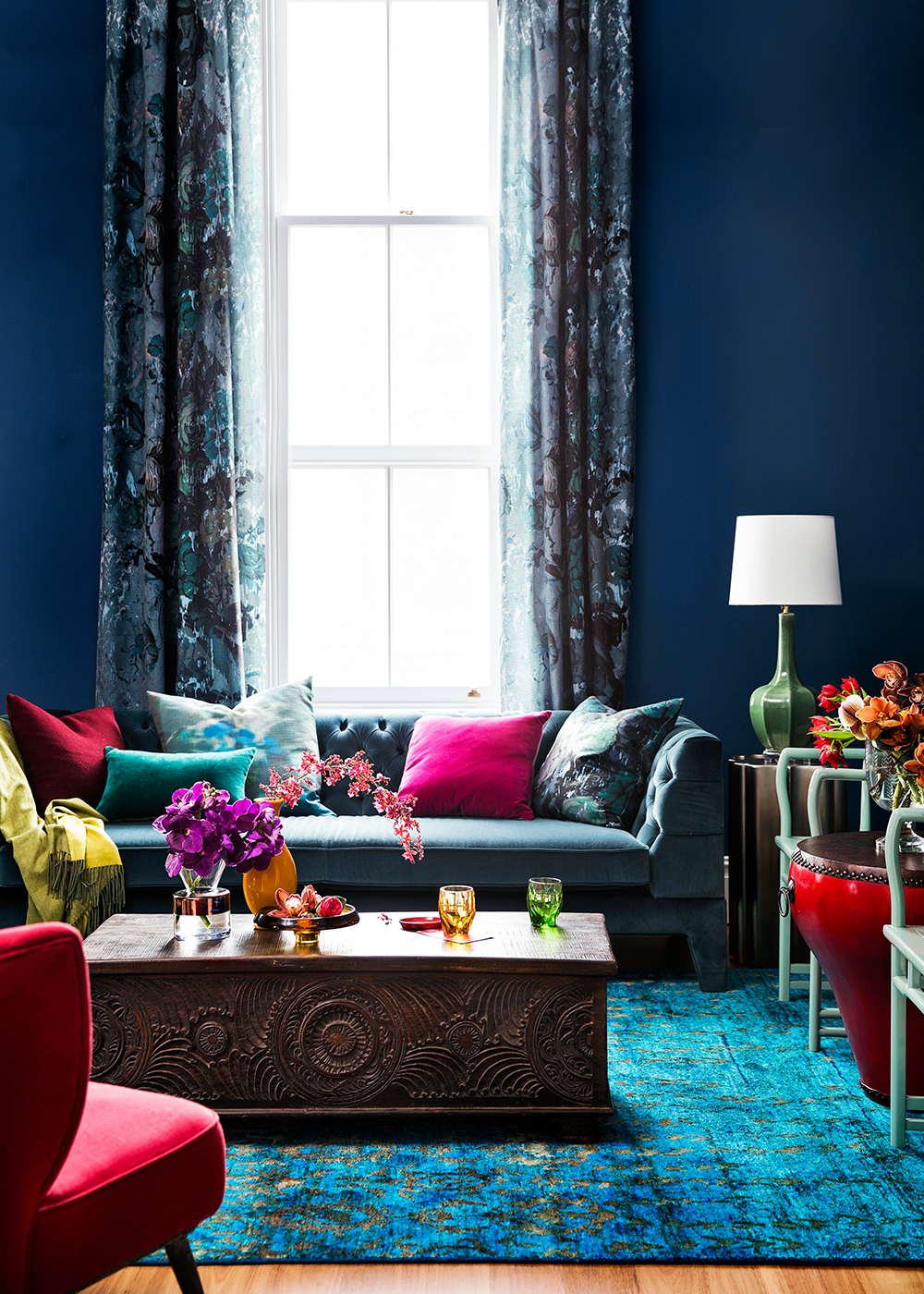 Contemporary living room walls painted in Dulux Passionate Blue. Via Home Beautiful