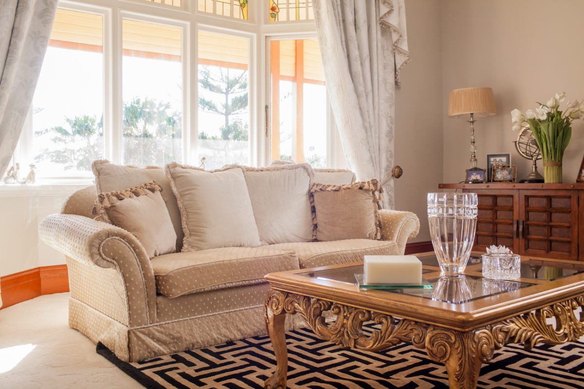 Traditional living room in a neutral color scheme. Australian interior designer
