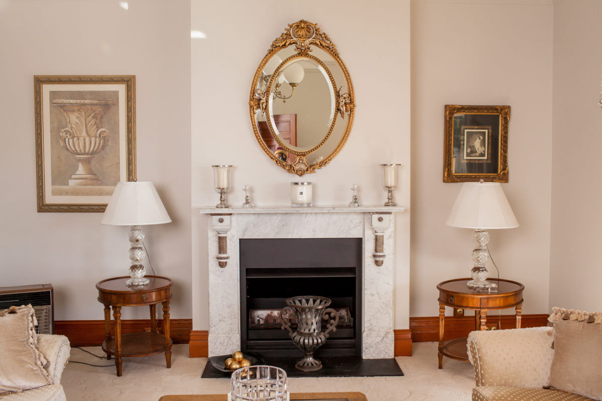 Fireplace in the living room of a neutral color schemed living room in Australia