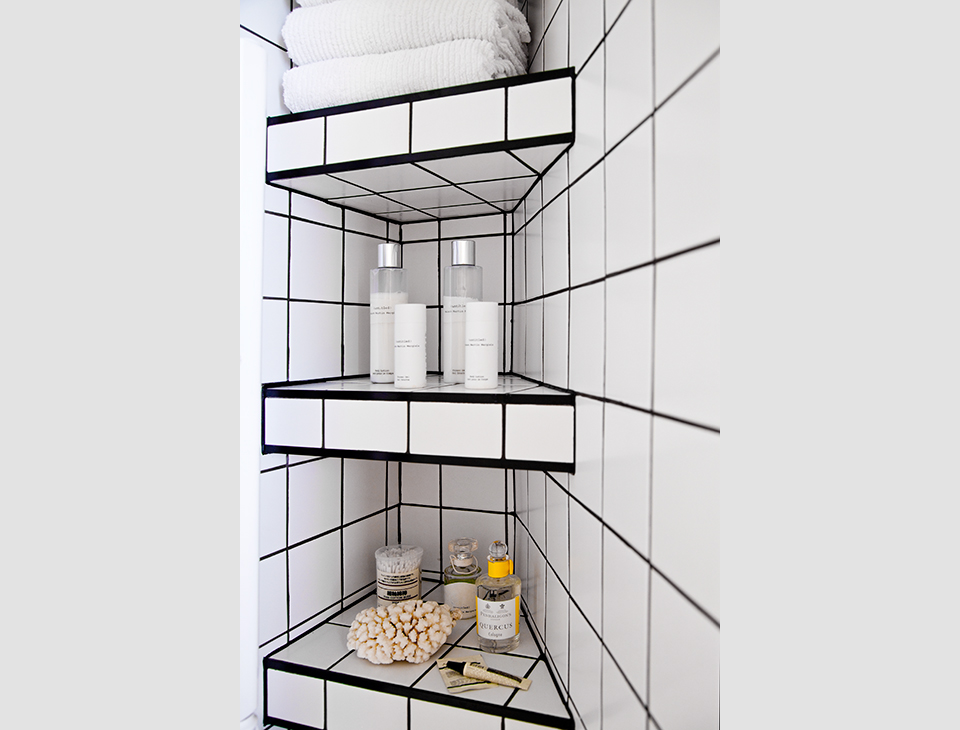 black and white bathroom corner shelf
