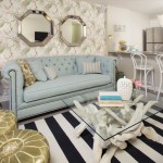 Eggshell Blue Sofa and Gold Ottomans