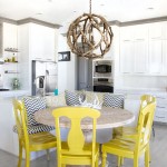 Modern White Kitchen with Yellow Chairs