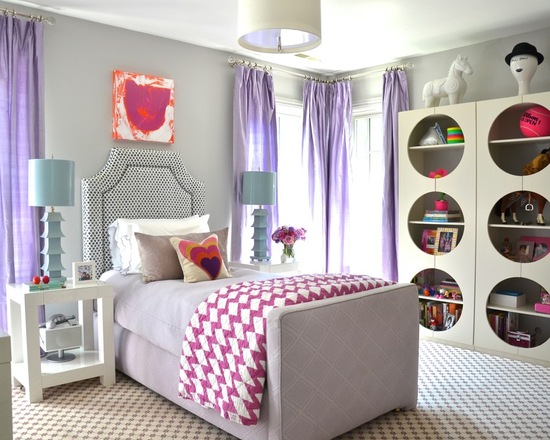 Eclectic teen room for girls with walls painted in farrow and ball - elephants's breath. The purple undertones stand out more with the use of purple curtains. 