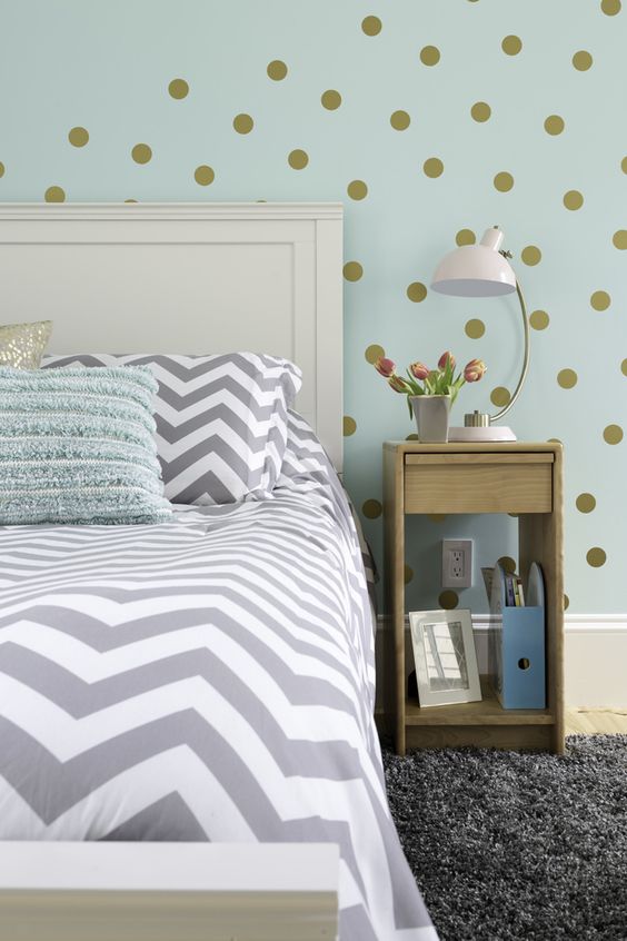 Girl's bedroom in aqua, gray, white and gold color palette with feature wall painted in Sherwin Williams Tame Teal.