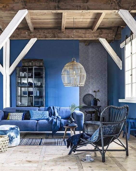 Bohemian styled moody blue living room
