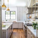 Benjamin Moore Gray Huskie Kitchen Cabinets and Brass Fixtures. Light gray and brass paint color scheme kitchen