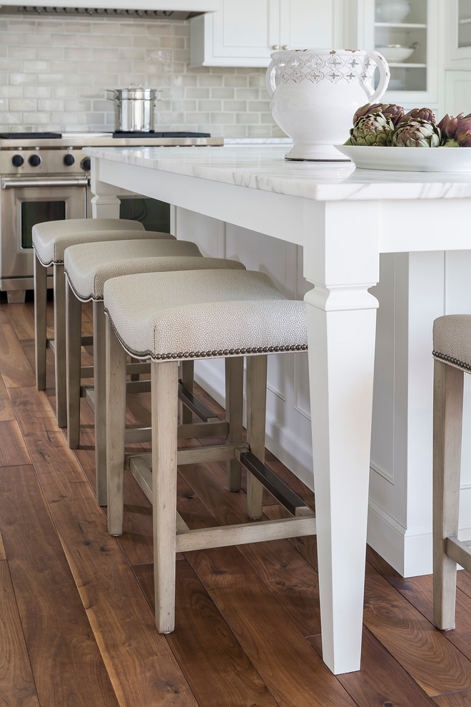 Benjamin Moore Simply White Painted Kitchen Cabinets. White kitchen color scheme with timber floors.