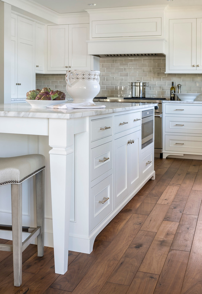 Benjamin Moore Simply White Painted Kitchen Cabinets. White kitchen color scheme with timber floors.