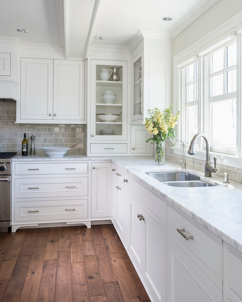 Benjamin Moore Simply White Painted Kitchen Cabinets. White kitchen color scheme with timber floors.