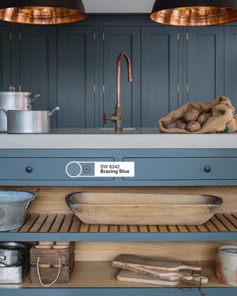 Kitchen cabinets painted in Sherwin William's Bracing Blue. Blue painted kitchen cabinets. Blue paint color scheme.