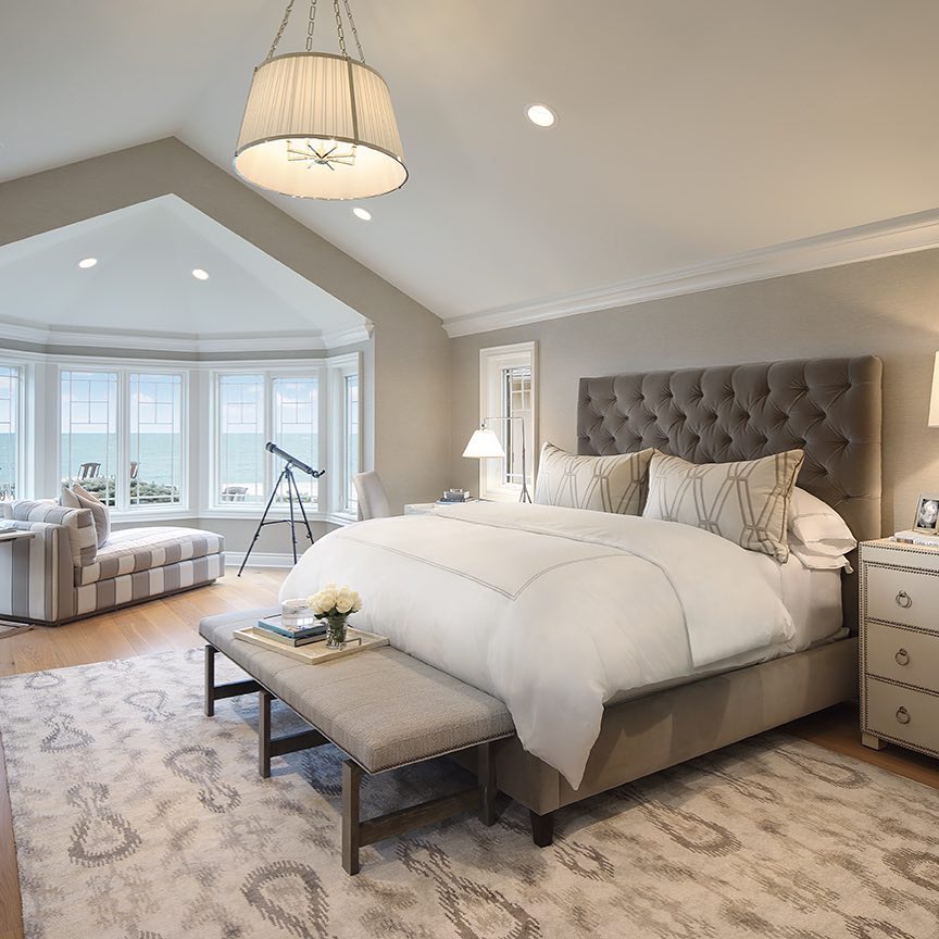 Monochromatic gray color scheme bedroom. Gray painted walls