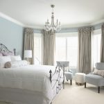 Light blue bedroom color scheme with Benjamin Moore's Summer Shower on the walls and Glacier White on the ceilings.