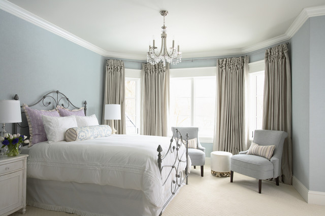 Light blue bedroom color scheme with Benjamin Moore's Summer Shower on the walls and Glacier White on the ceilings.