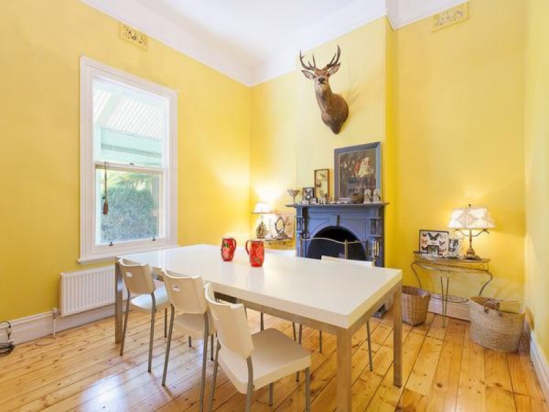 Yellow painted dining room color scheme