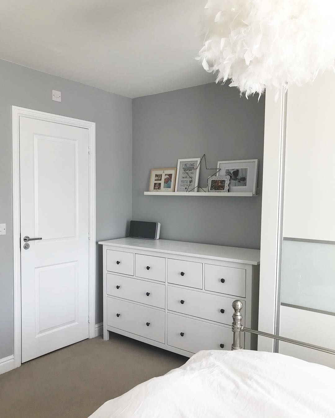 Dulux Most Popular Grey Paint Colours. Bedroom walls painted in Dulux Goose Down. 