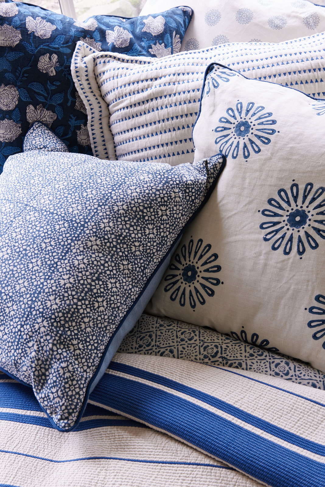 Blue and white soft furnishings.