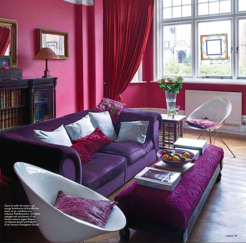 Deep pink and purple living room idea. Pink and purple living room color scheme in bold saturated colors.