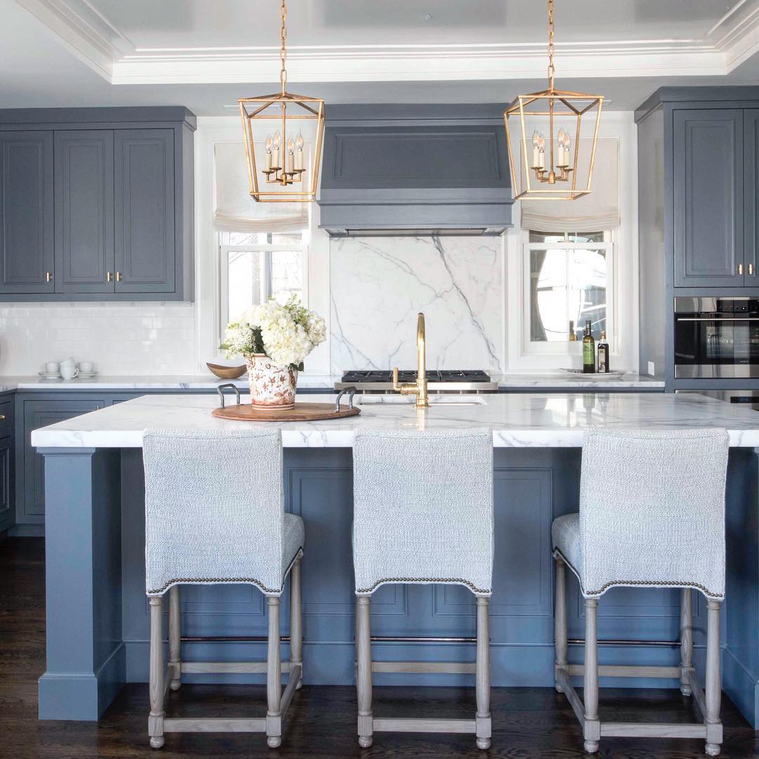 Kitchen with gray blue cabinets.