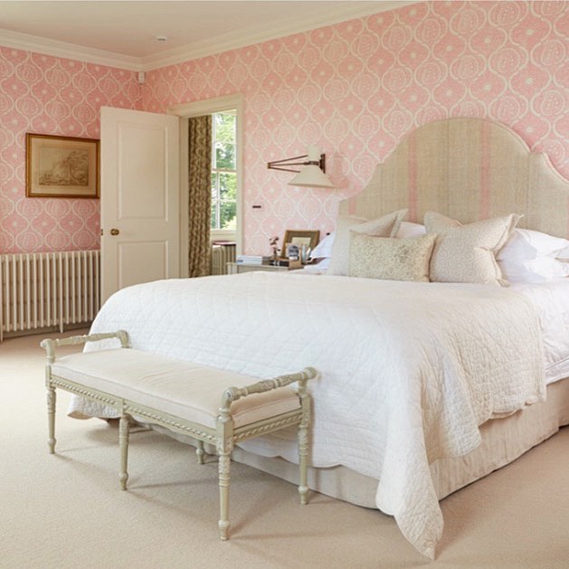 Pink and white color scheme bedroom.