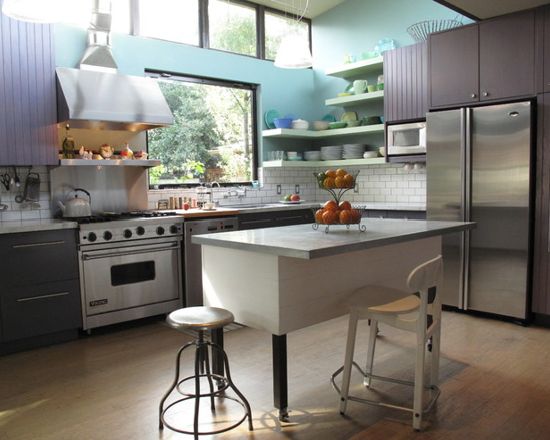 Purple and blue kitchen with kitchen cabinets painted in Benjamin Moore Purple Haze and Walls in Benjamin Moore Boca Raton Blue.