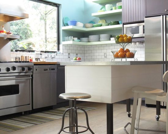 Purple and blue kitchen with kitchen cabinets painted in Benjamin Moore Purple Haze and Walls in Benjamin Moore Boca Raton Blue.