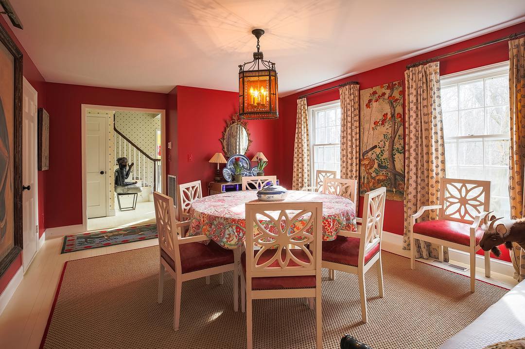 Traditional red dining room color scheme.