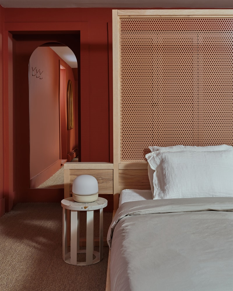 Bedroom with rusty red painted walls