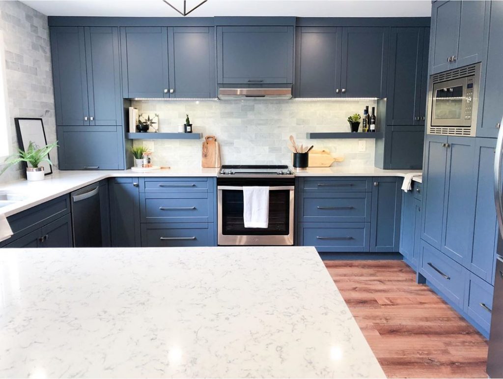 Benjamin Moore Gray Wolf painted blue kitchen cabinets