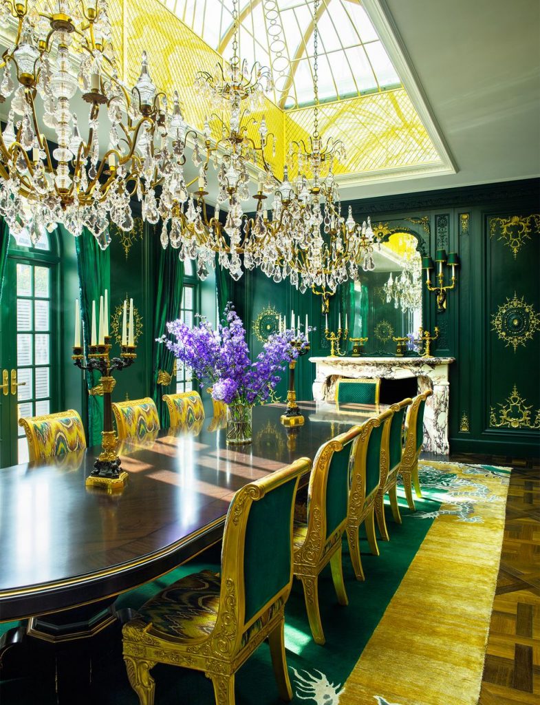 Formal dining room in green and gold color scheme