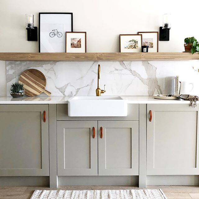 Kitchen cabinets painted in Benjamin Moore Meditation AF-395 and walls in Benjamin Moore Soft Chamois OC-13