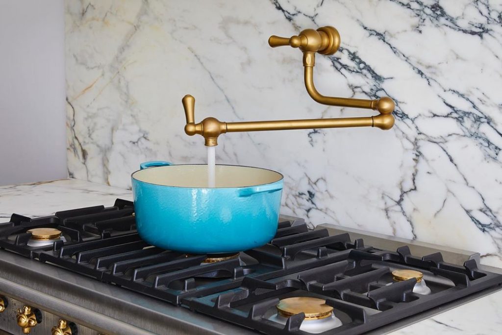 Marble splashback and brass hardware