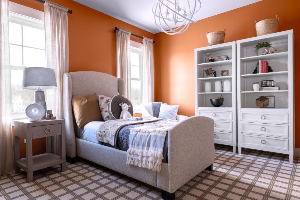 Child bedroom with orange painted walls