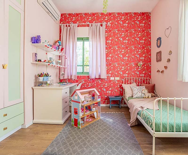 Girl's bedroom interior in mint and red