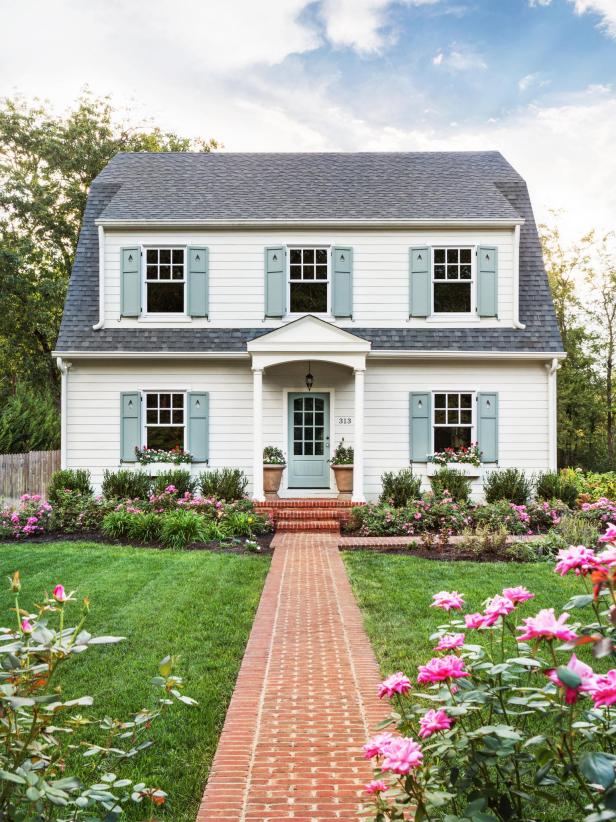 Glidden Pebble White (shutters and front door) + Benjamin Moore Wedgewood Gray (trim) + Benjamin Moore White Dove