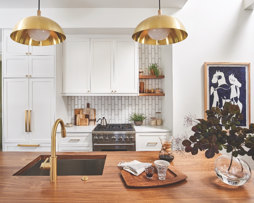 Kitchen white cabinets and walnut island counter