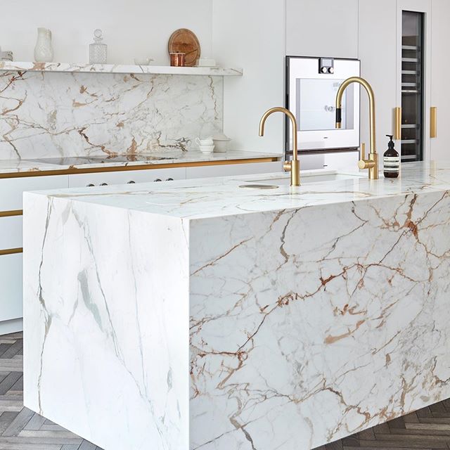 Marble kitchen design with brass fittings design 2020